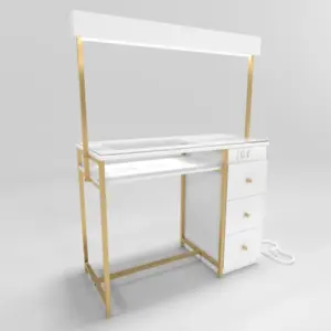 Mesa de manicure blanca con estructura dorada Mesa de manicure blanca con estructura dorada
